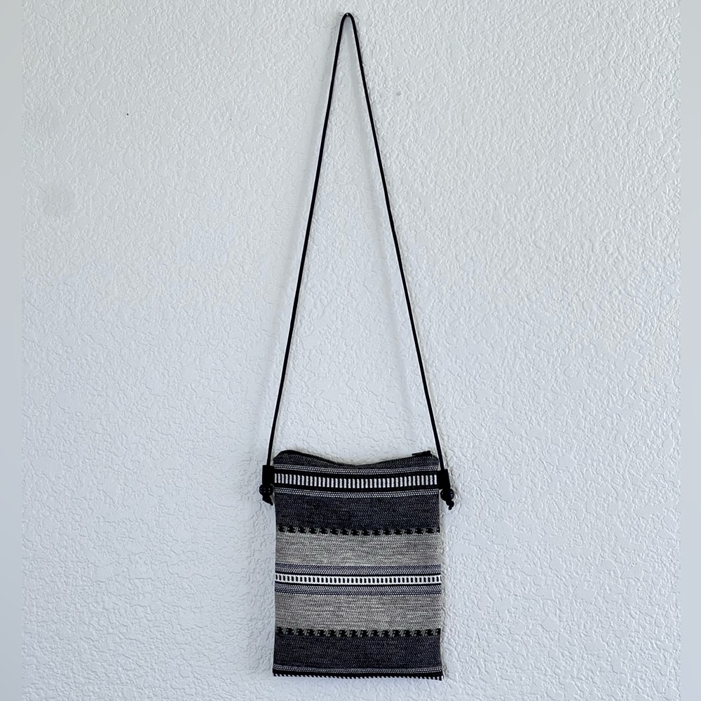 Like new black and white woven crossbody bag small